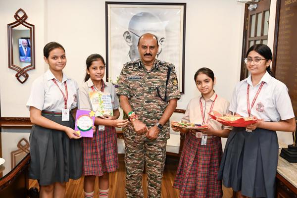   DAV Public School Sector 49 Gurugram and Jagran Public School Noida tied Rakhi on the wrist of DG CRPF